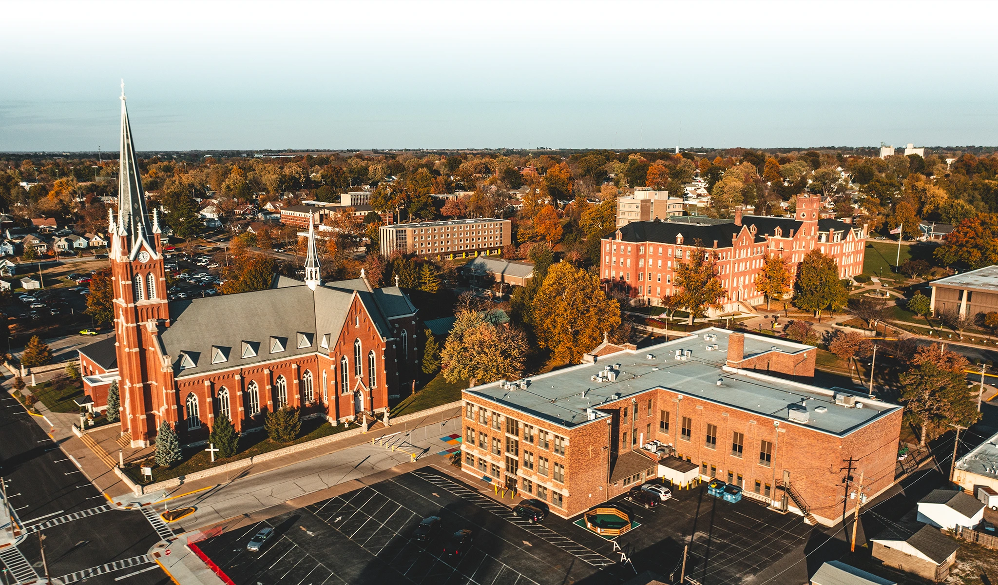 Aerial view of St. Francis Solanus Church and School in Quincy in the fall