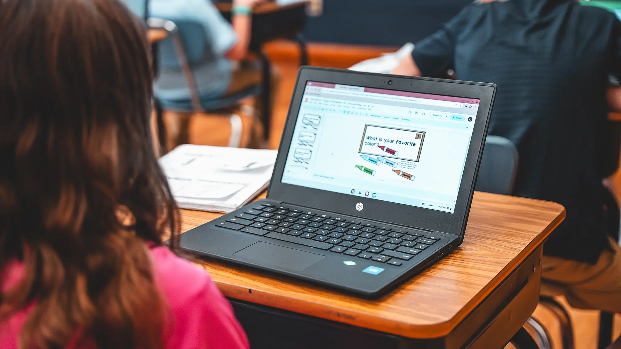 A St. Francis student working on a Chromebook at her desk
